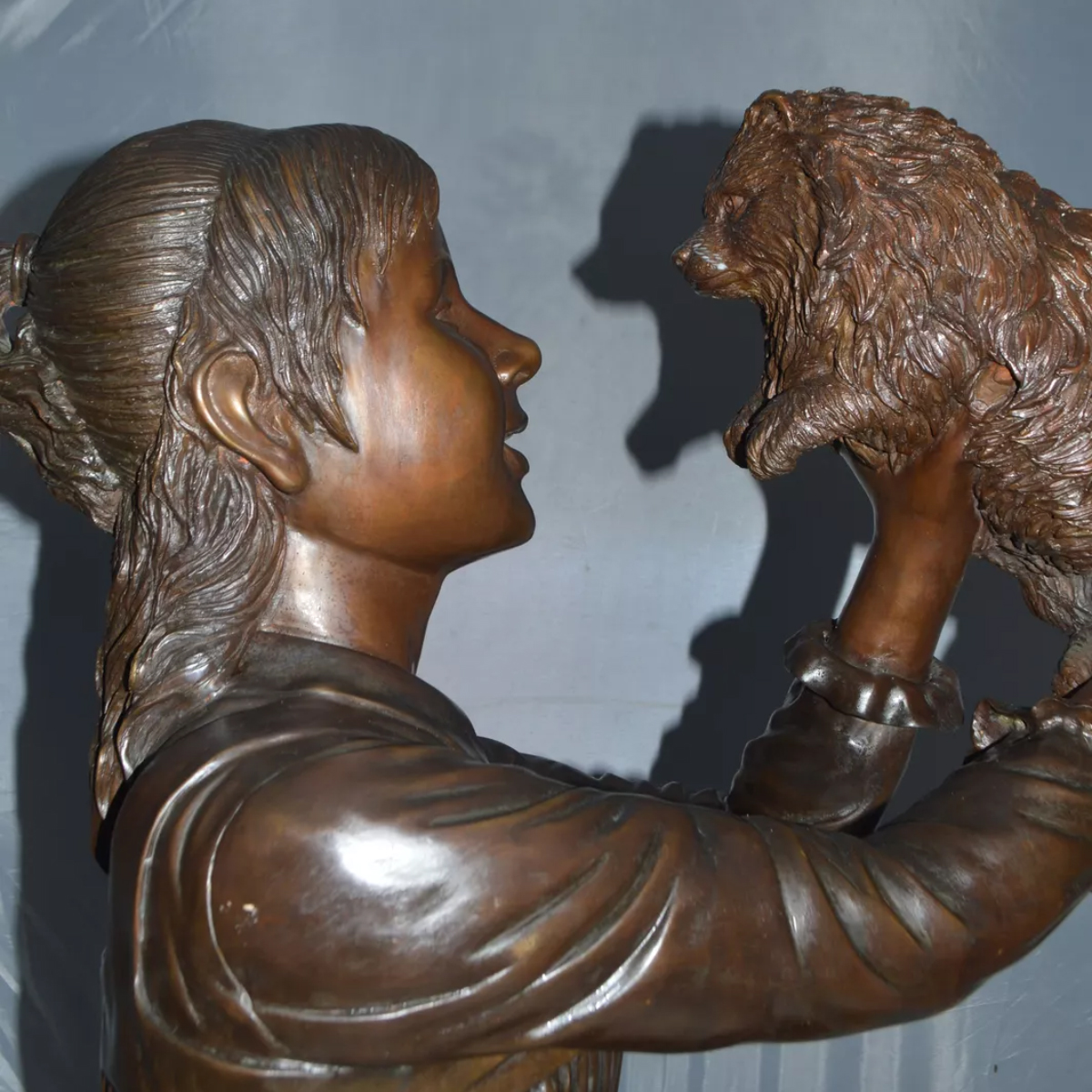 Girl with Dog Statue