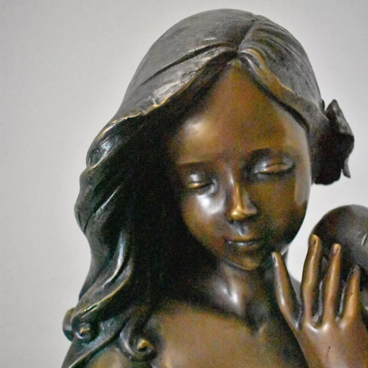 Girl with Shell Sculpture for Sale