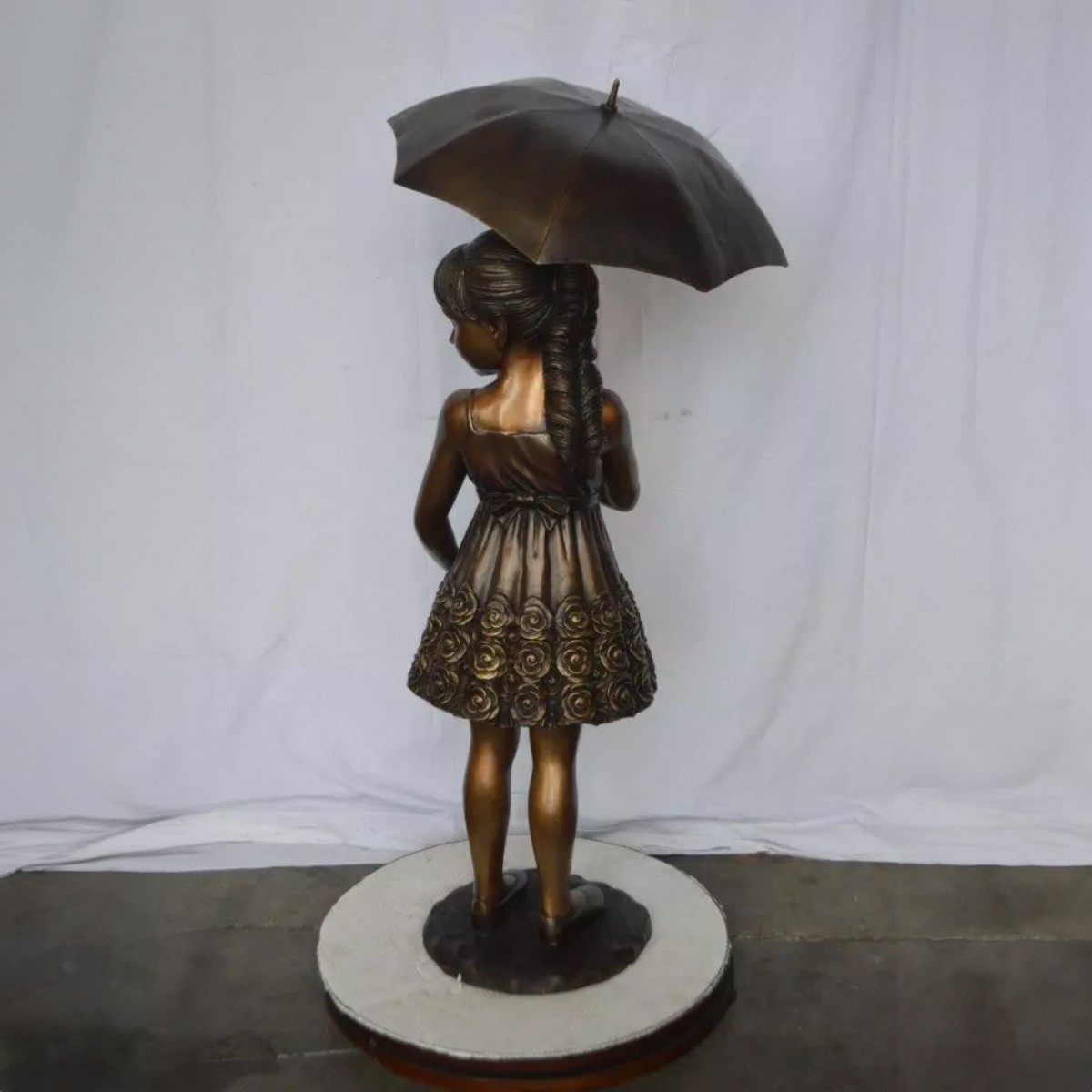 Girl with Umbrella Statue