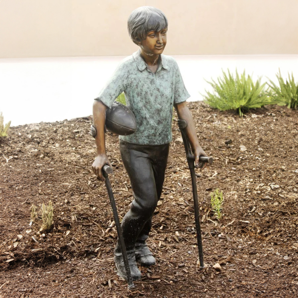 Kid with Crutches Statue