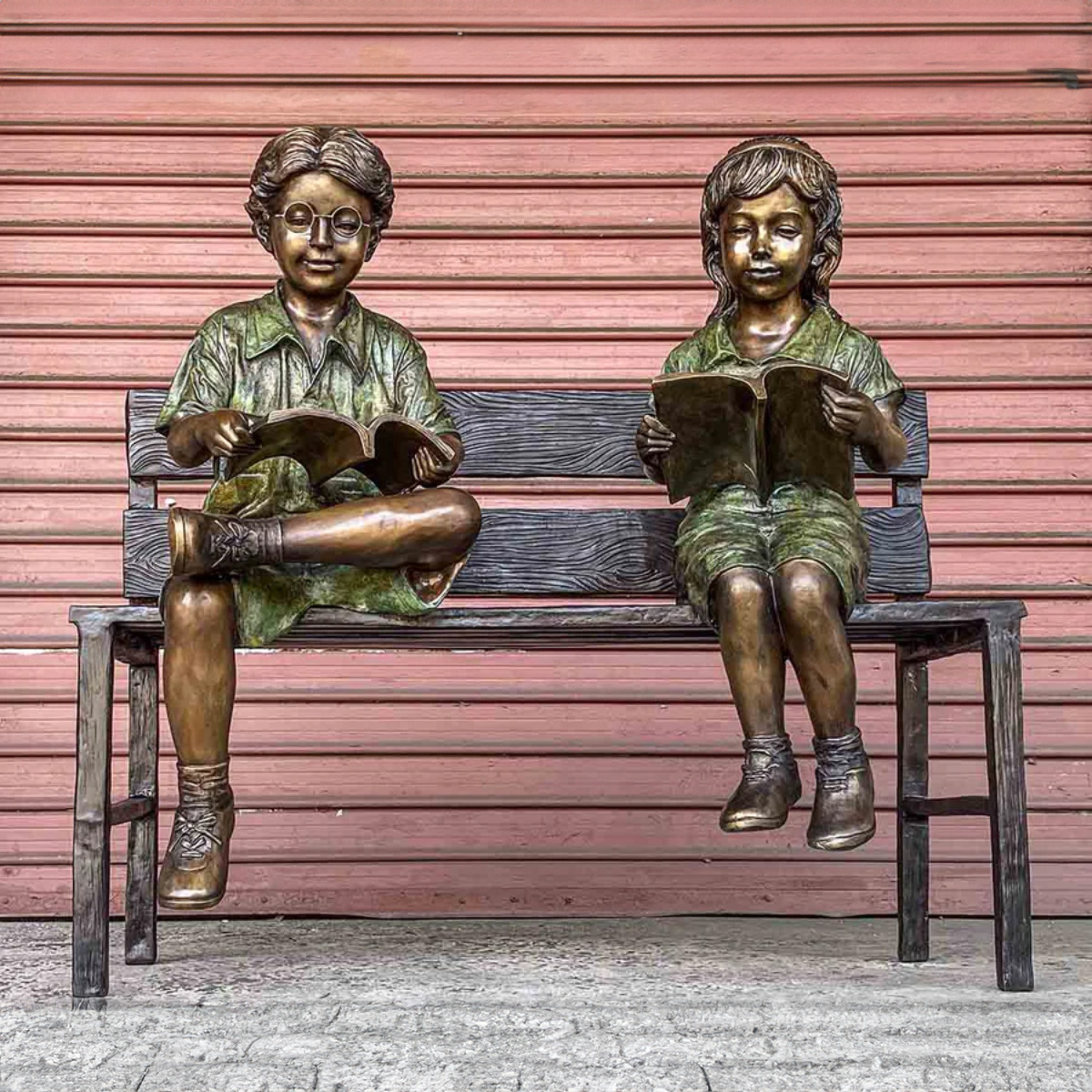 Kids Reading on Bench Statue