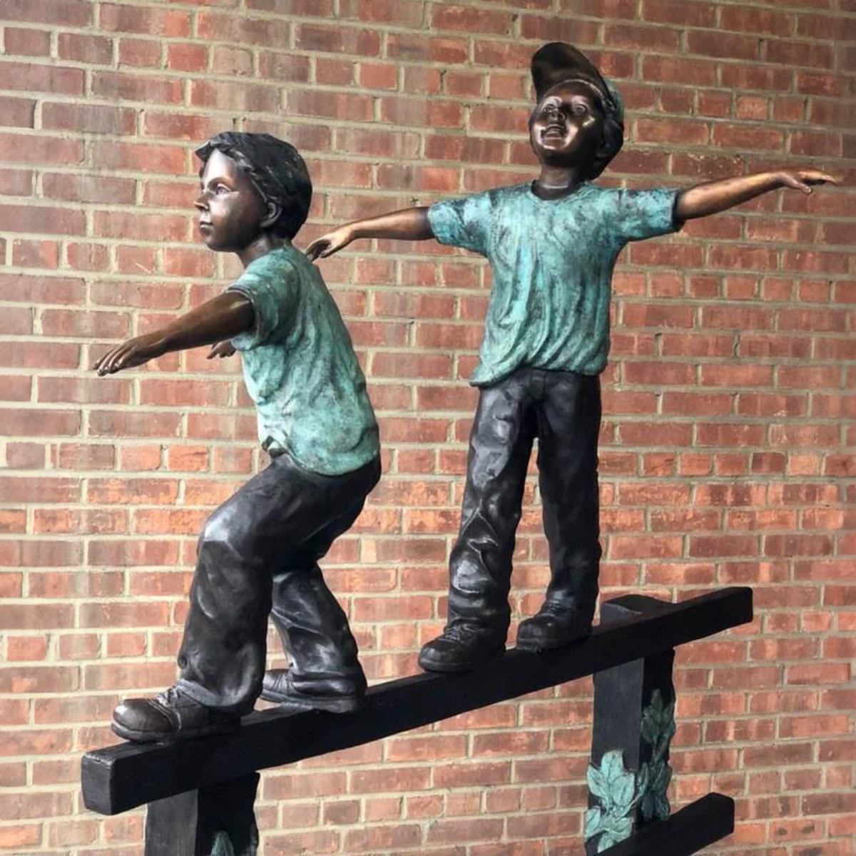 Kids on Fence Statue Outdoor