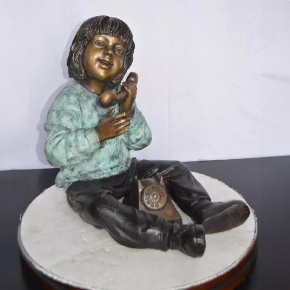 Large Bronze Child with Telephone