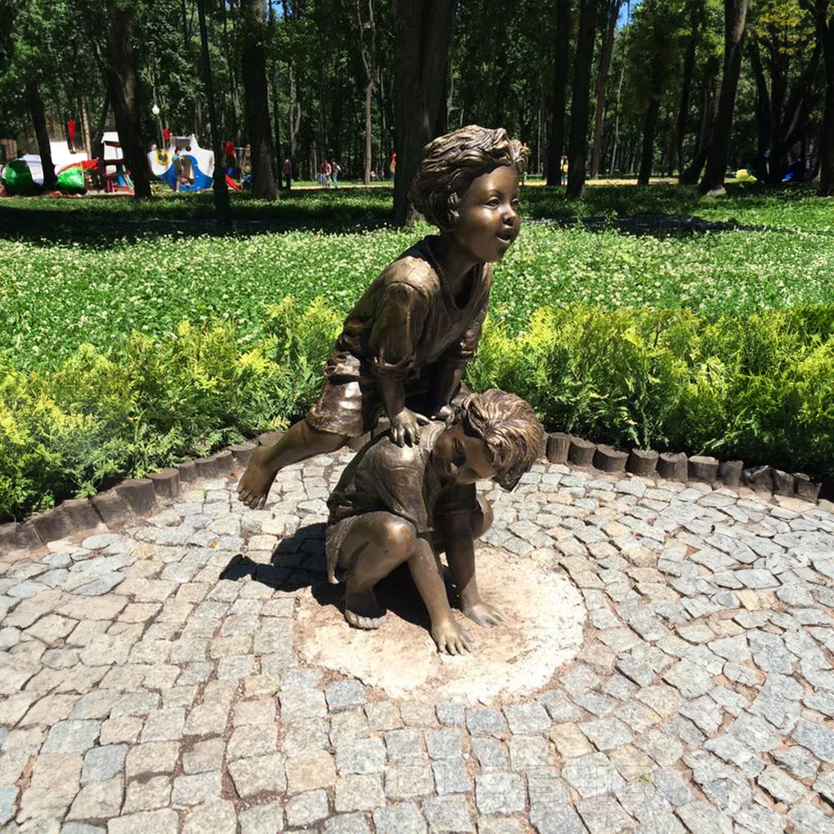 Leapfrog Playing Statue