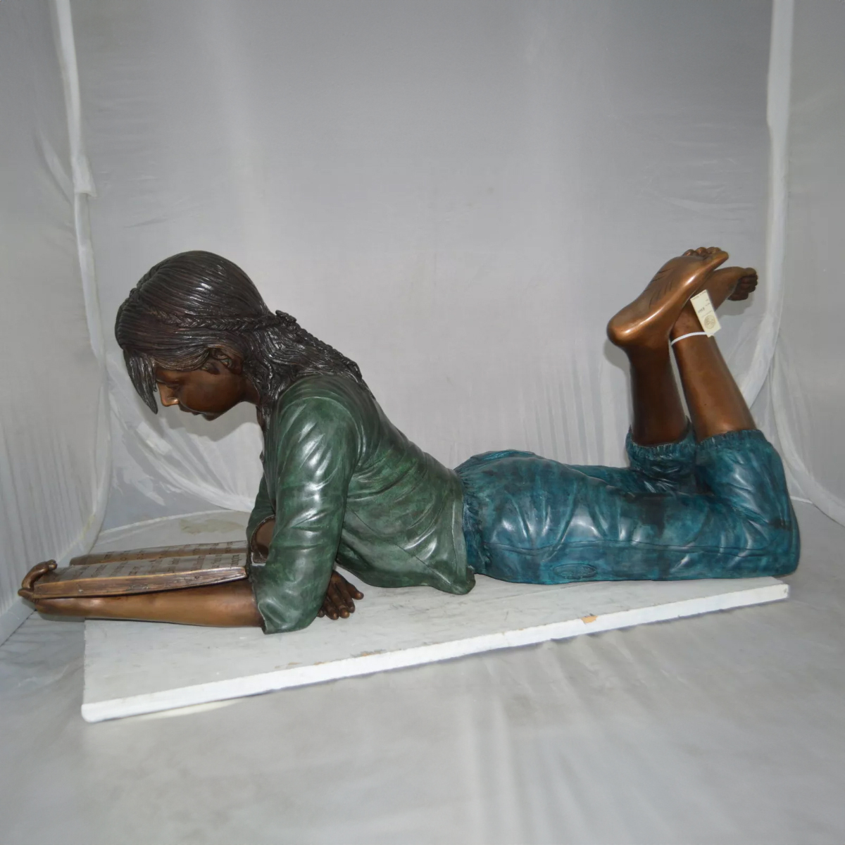 Lying Girl Reading Statue