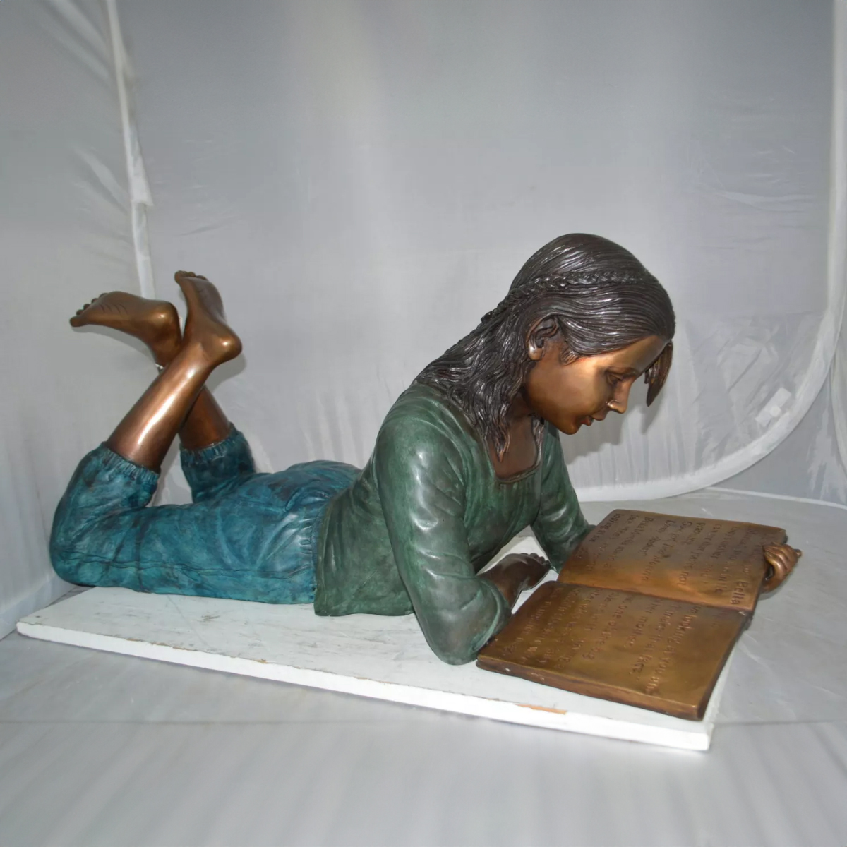 Lying Girl Reading Statue