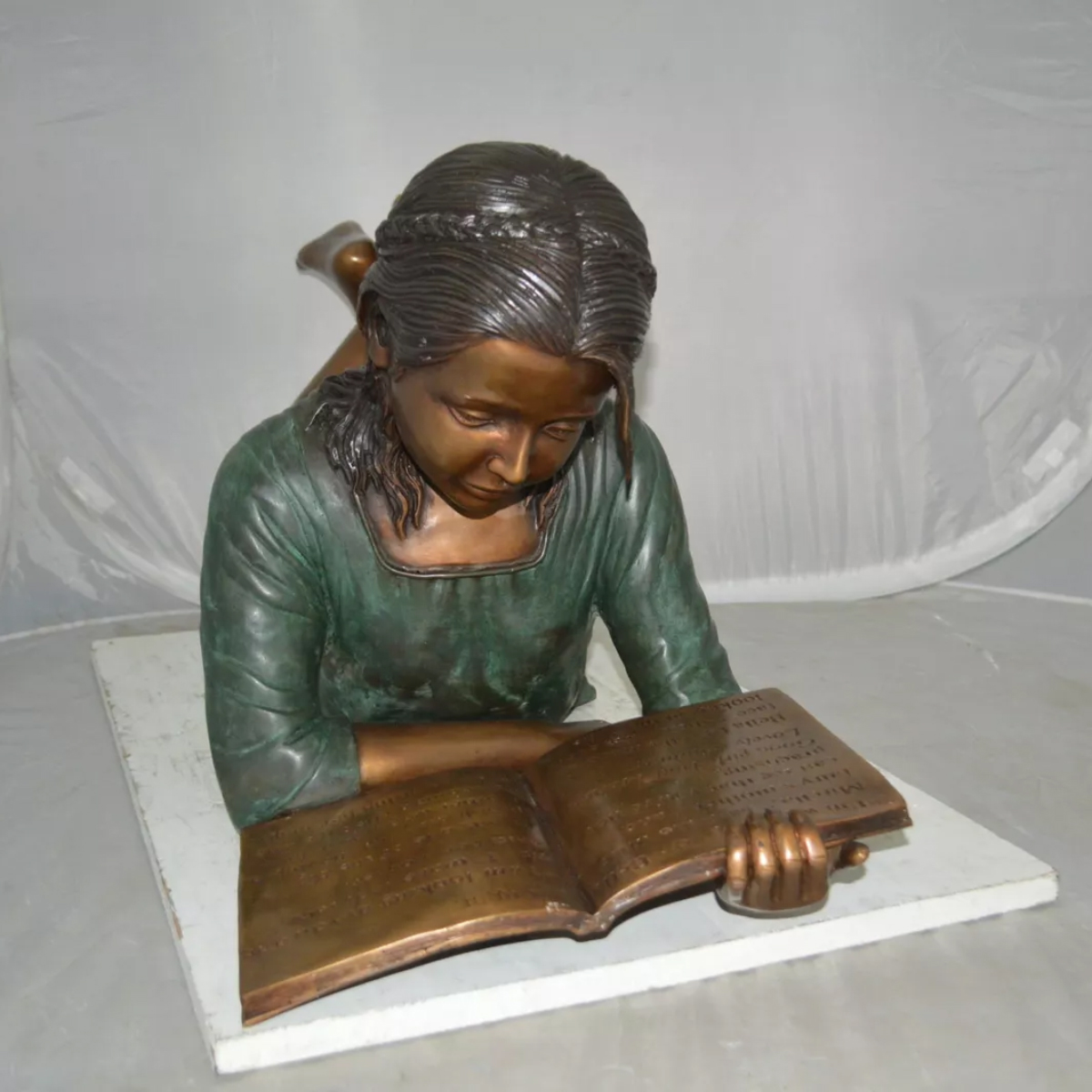 Lying Girl Reading Statue