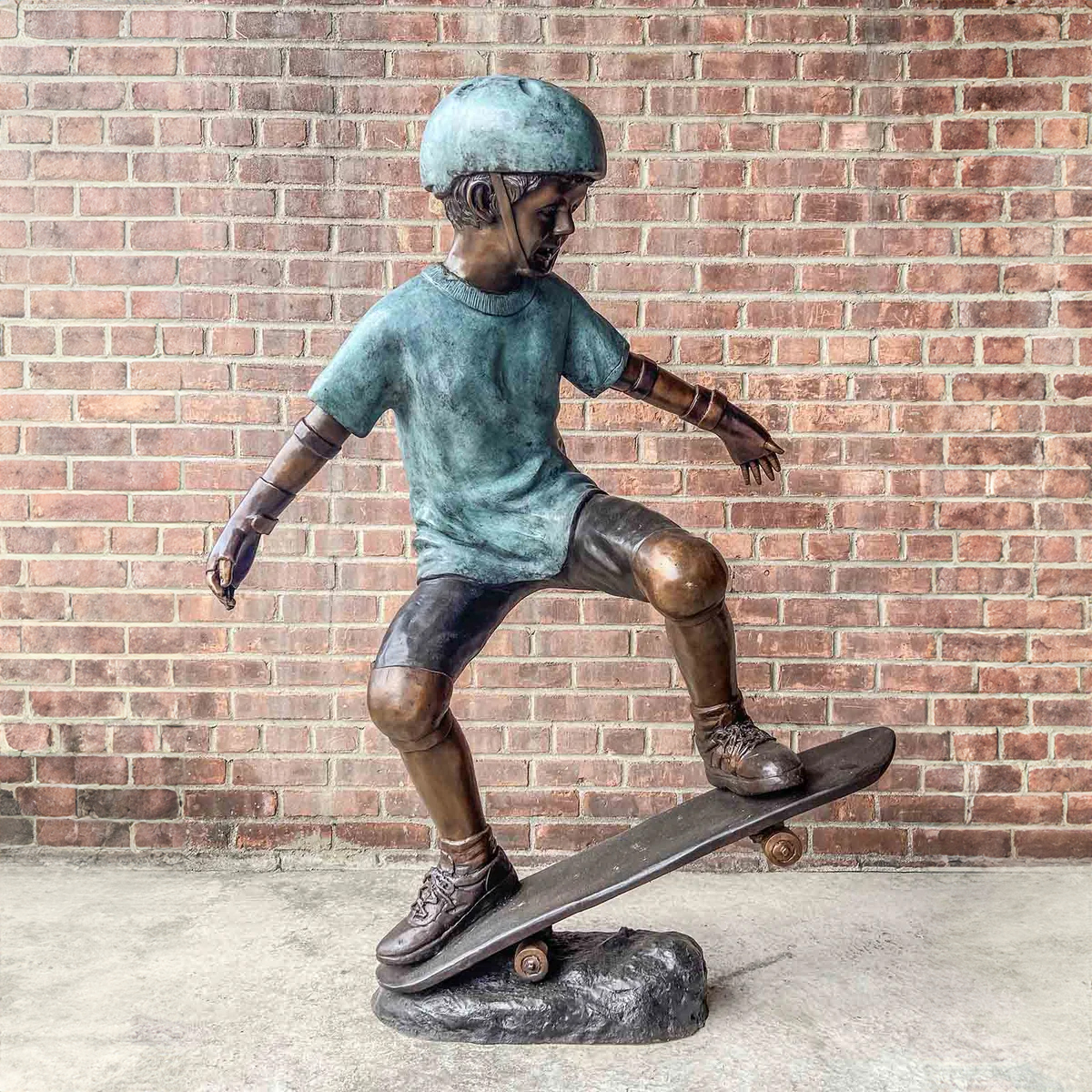 Skateboarding Boy Statue