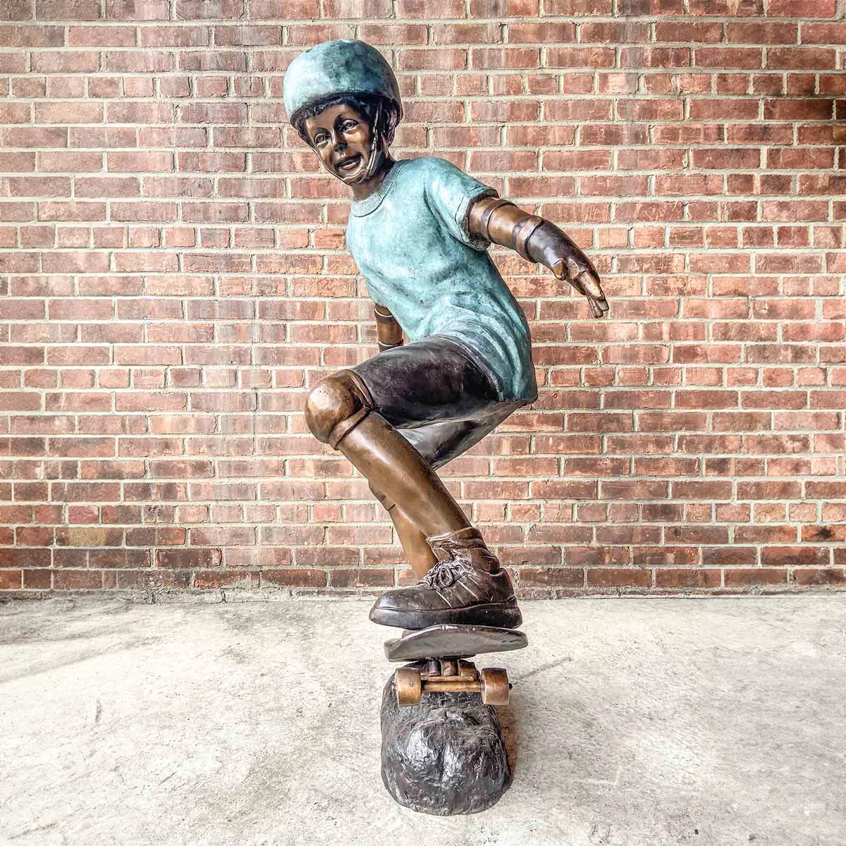 Skateboarding Boy Statue