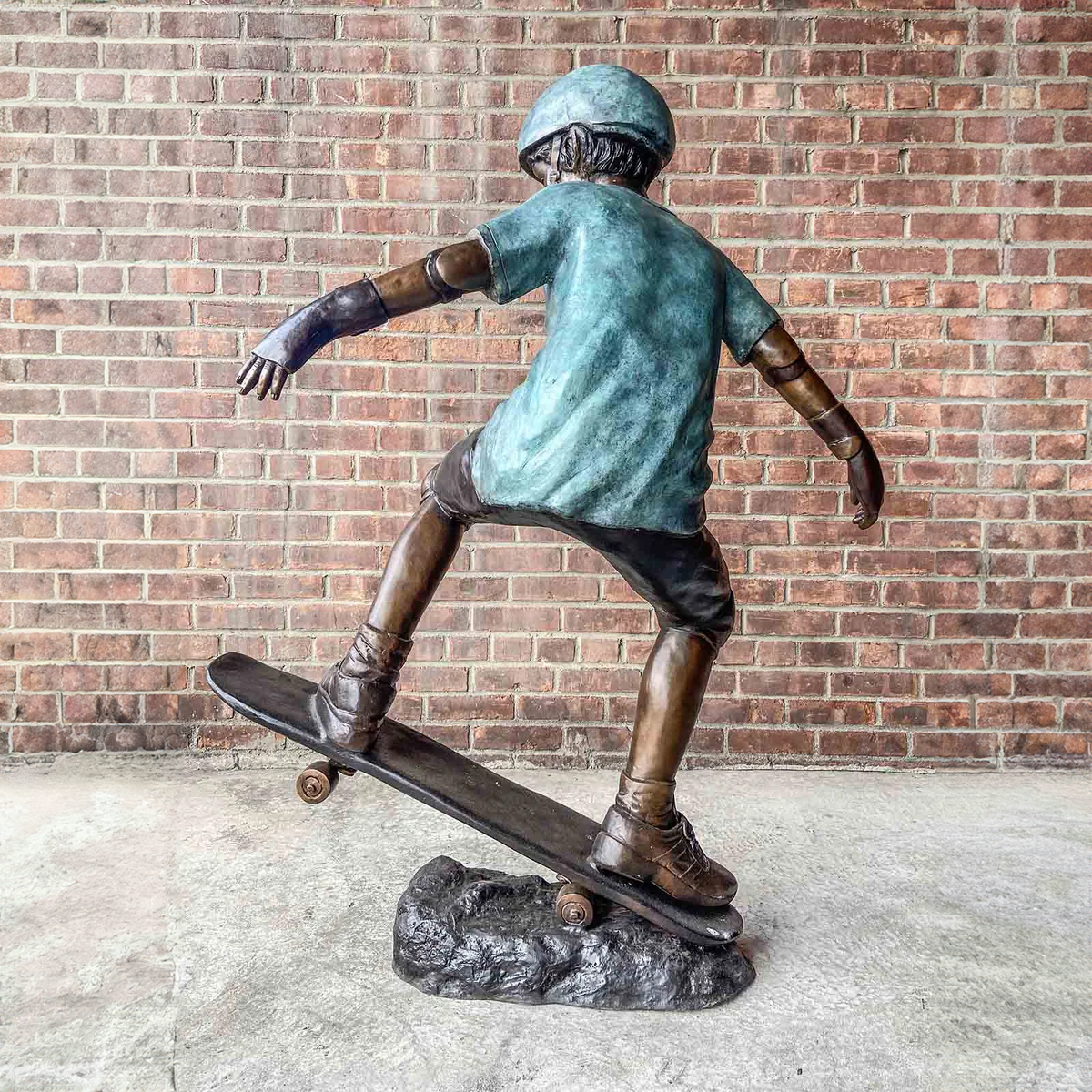 Skateboarding Boy Statue