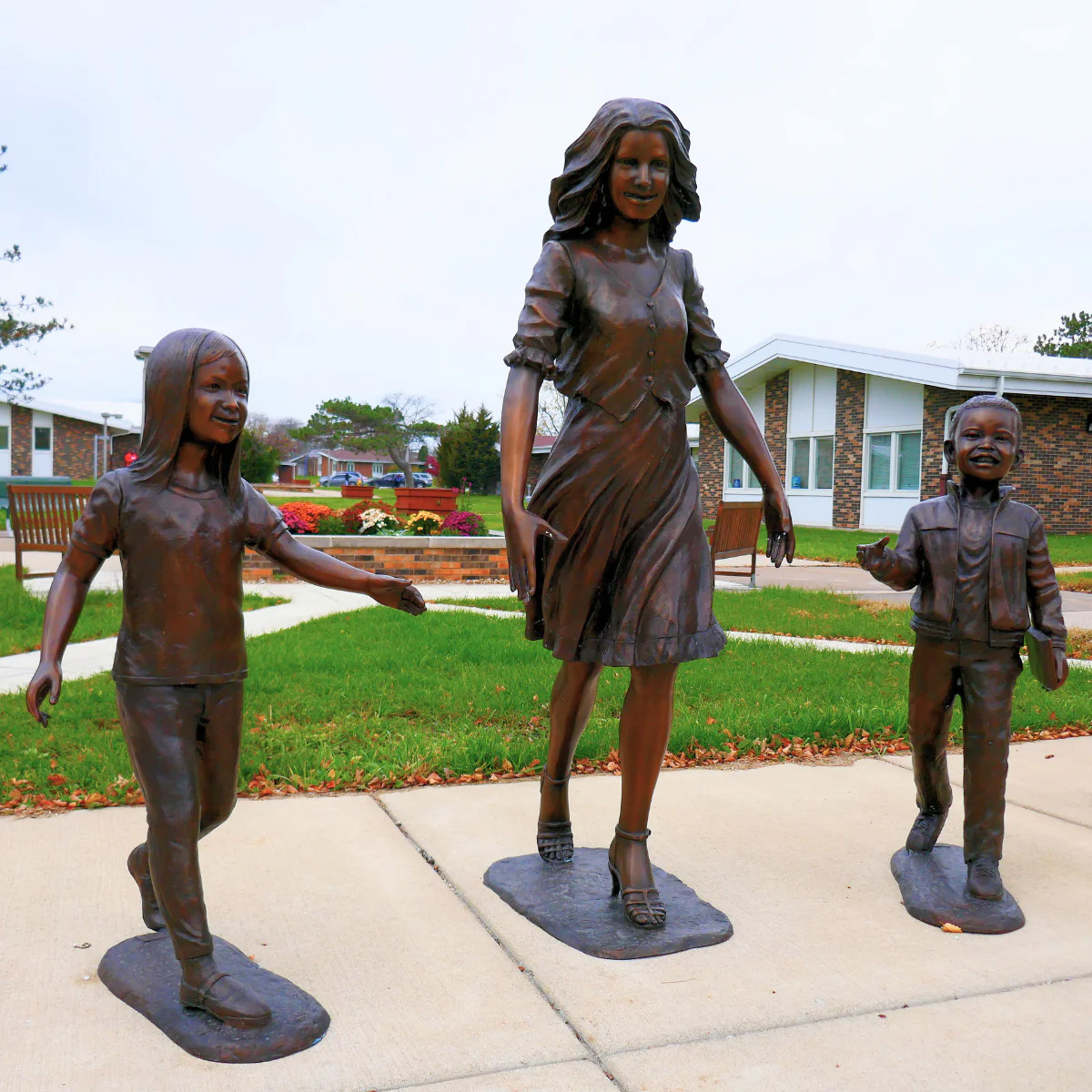 Teacher and Kids Statue