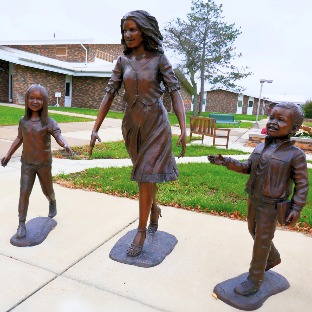 Teacher and Kids Statue