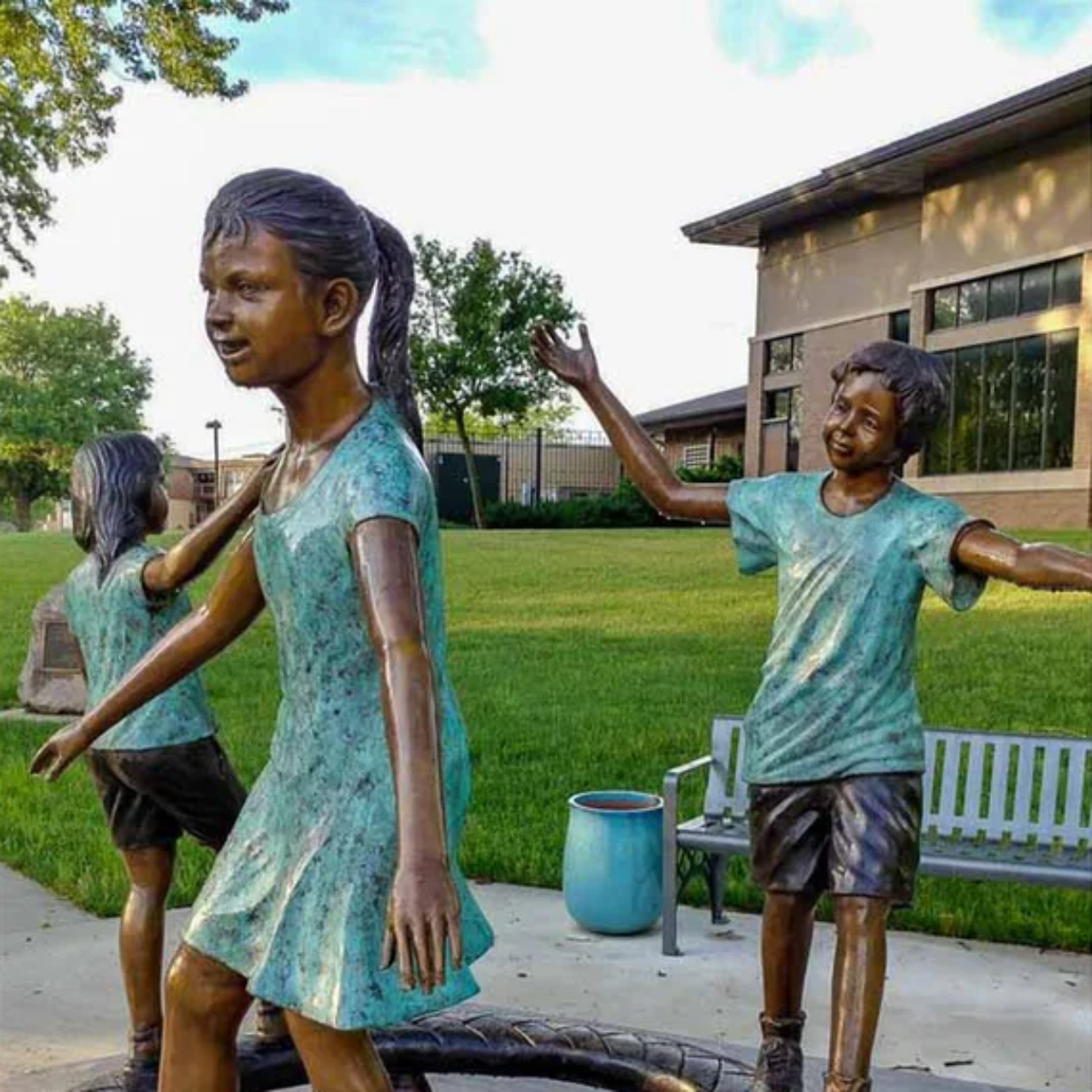 Three Kids Balancing Statue