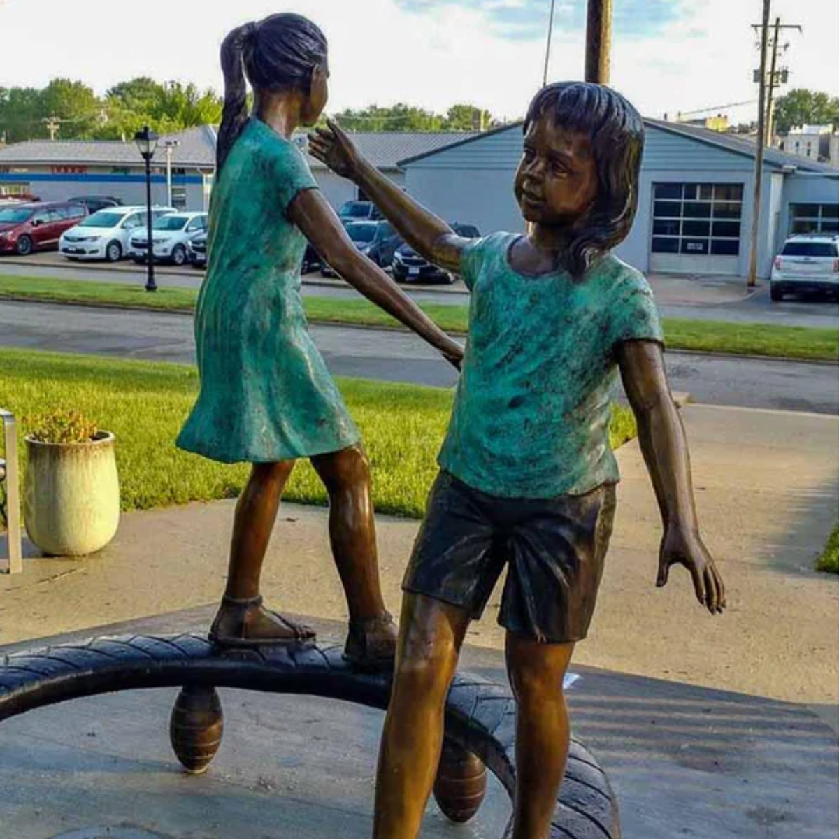 Three Kids Balancing Statue