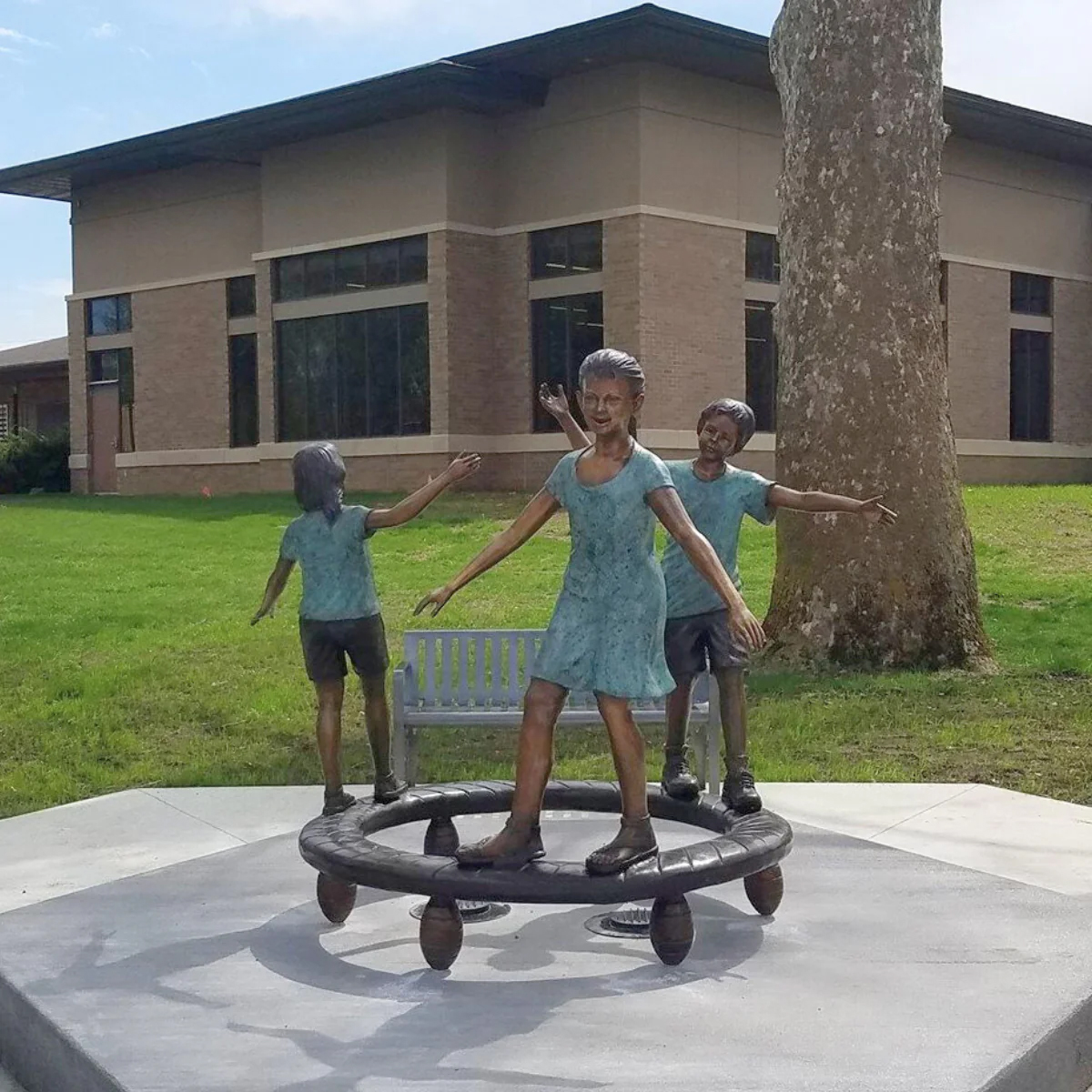 Three Kids Balancing Statue