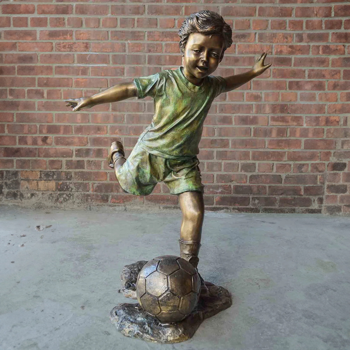 Young Soccer Player Statue