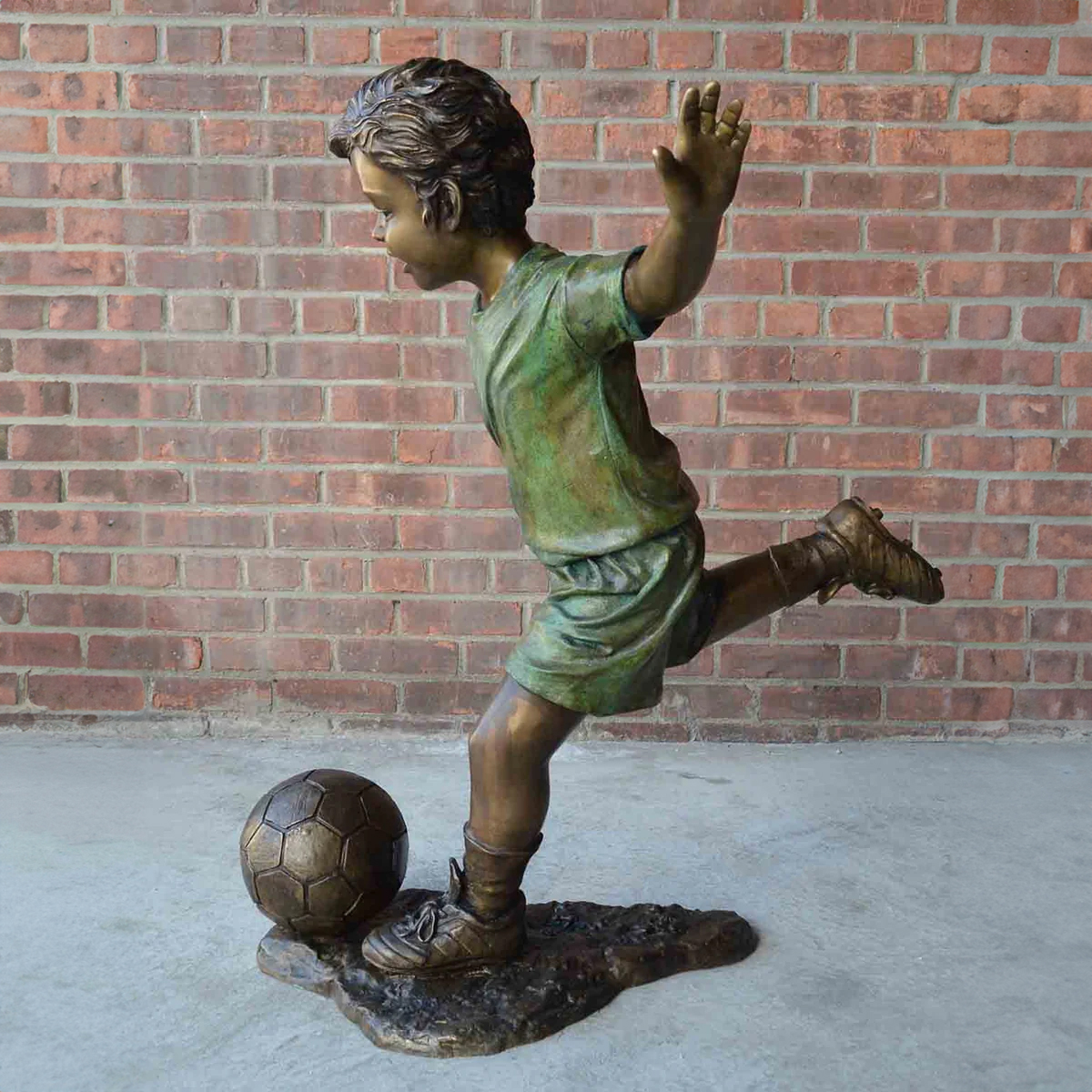 Young Soccer Player Statue