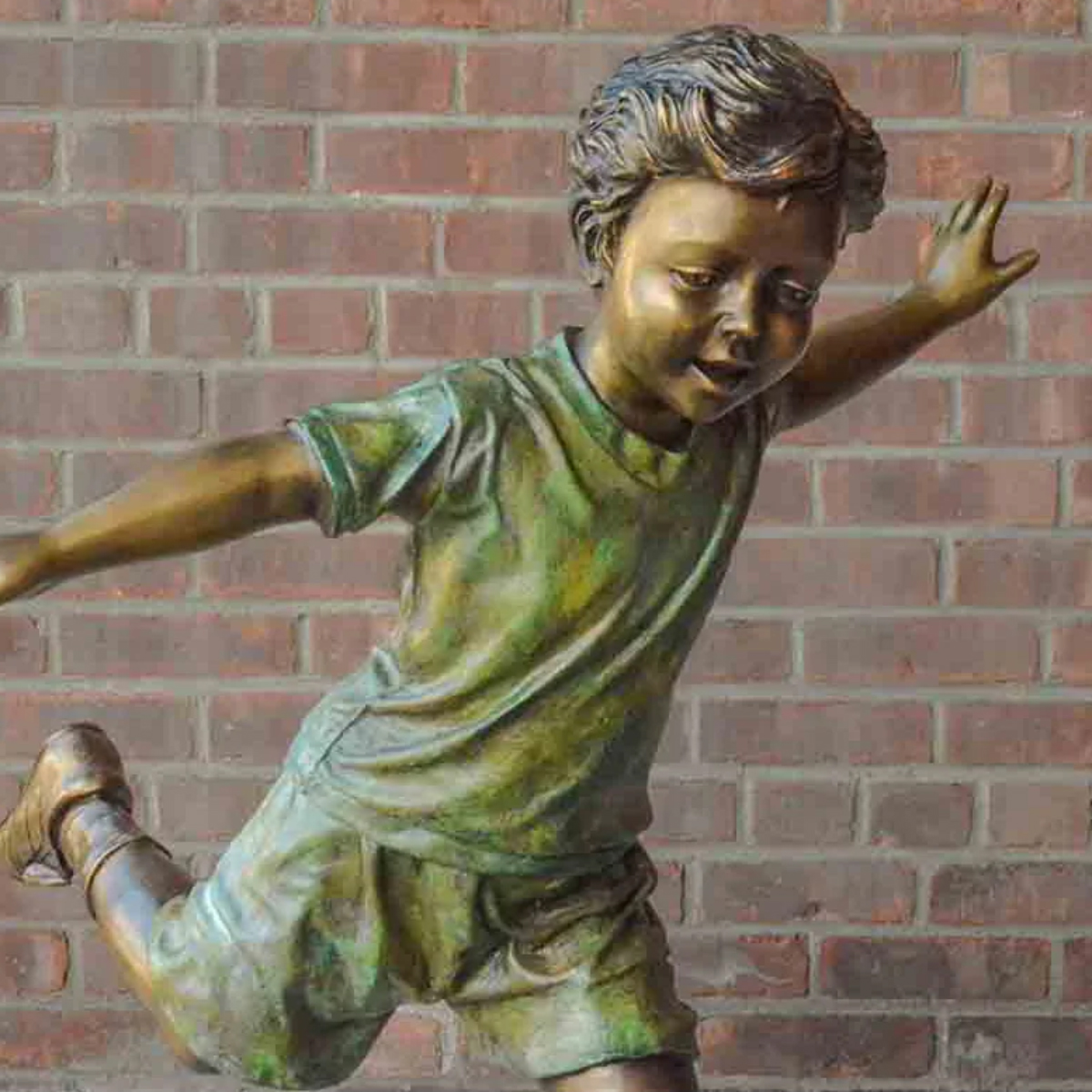 Young Soccer Player Statue