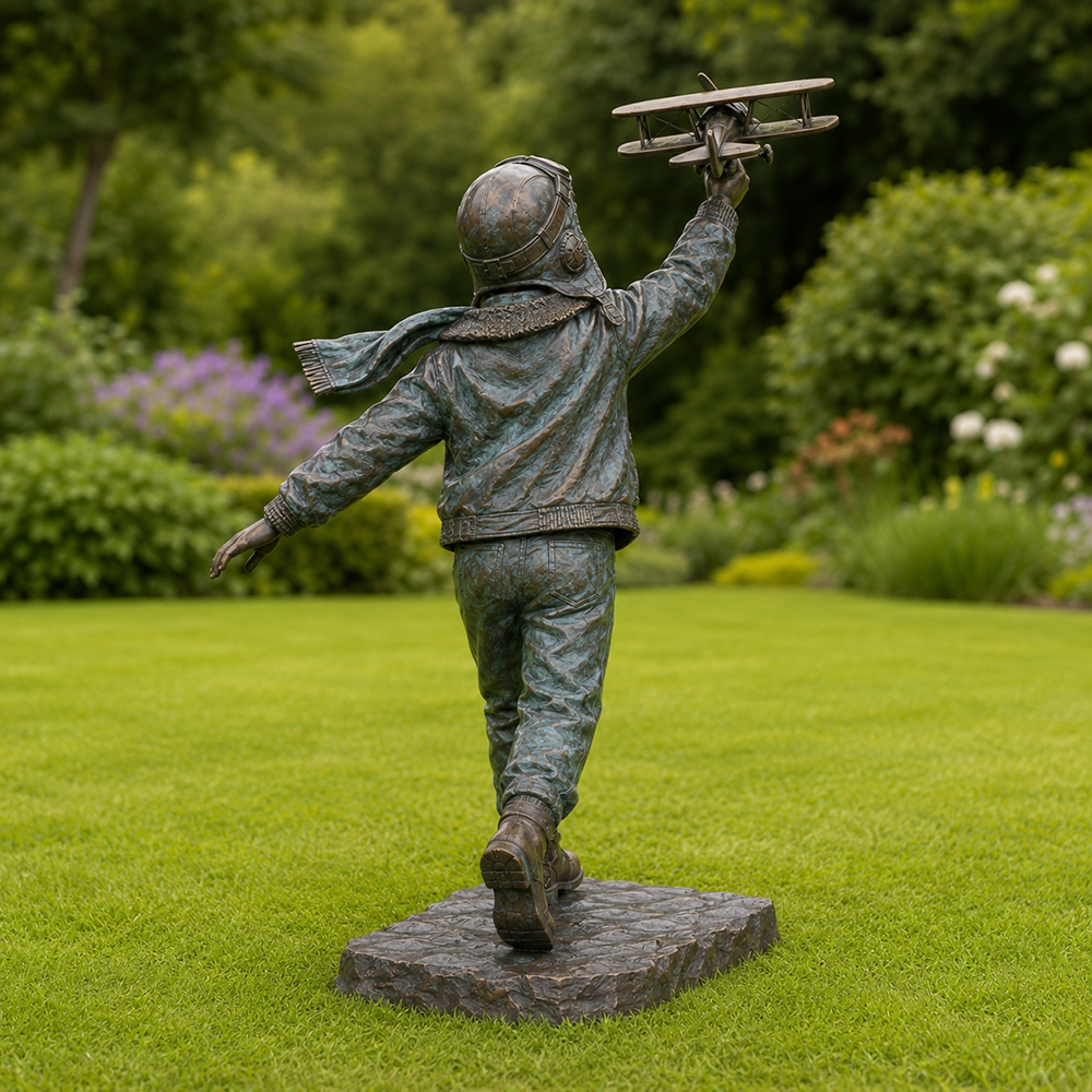 Bronze Boy Pilot Statue rear garden view