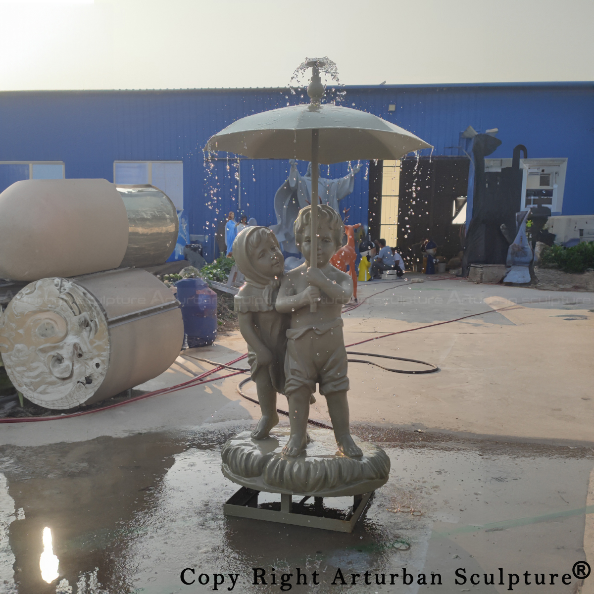 Boy and Girl Under Umbrella Garden Statue