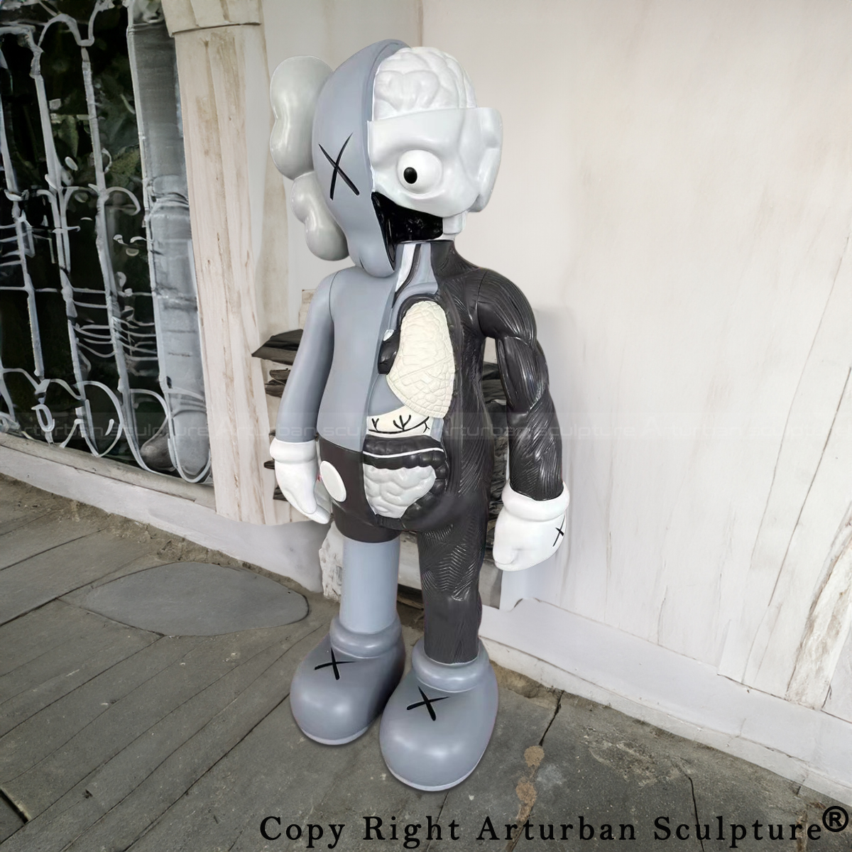 Grey Kaws half Dissected Companion Figure