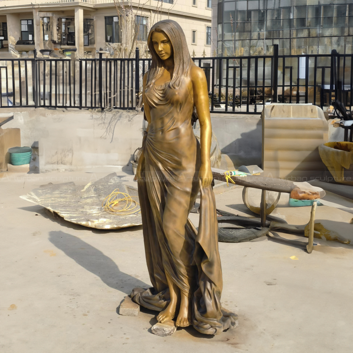 Nude lady in a flowing dress bronze Statue for Sale