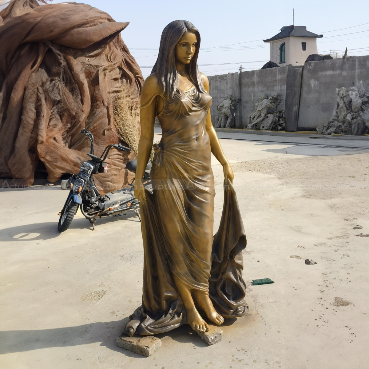 Nude woman barefoot lifting her gown Statue for Sale