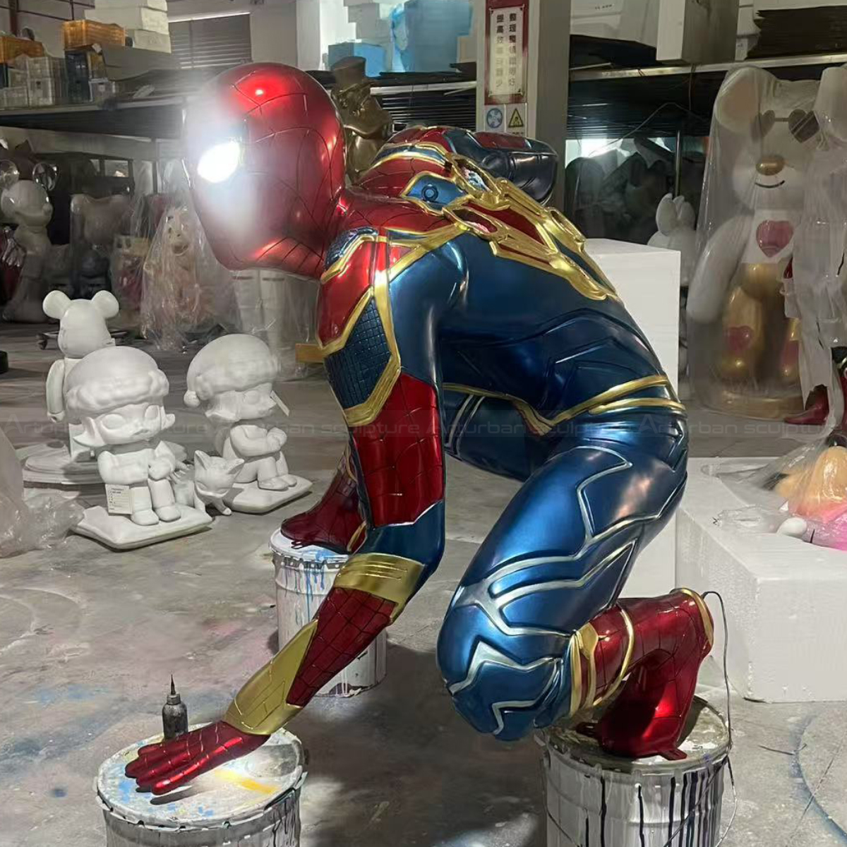 Spider-Man Advanced Suit statue in a crouching pose