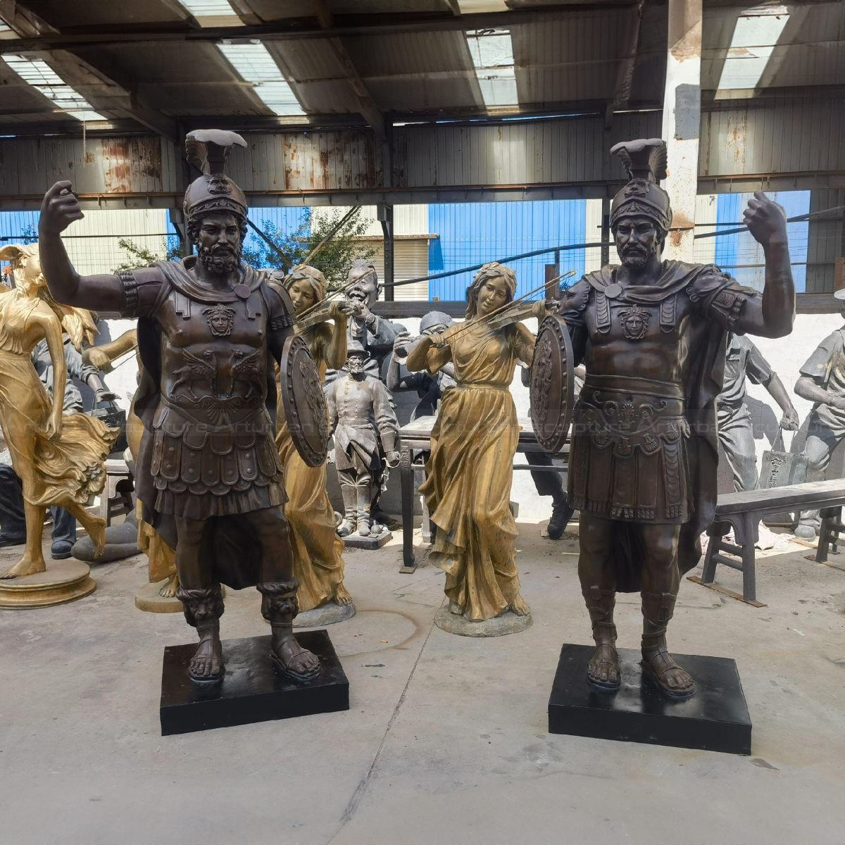 a pair of Ancient Roman Soldier Statue holding shields
