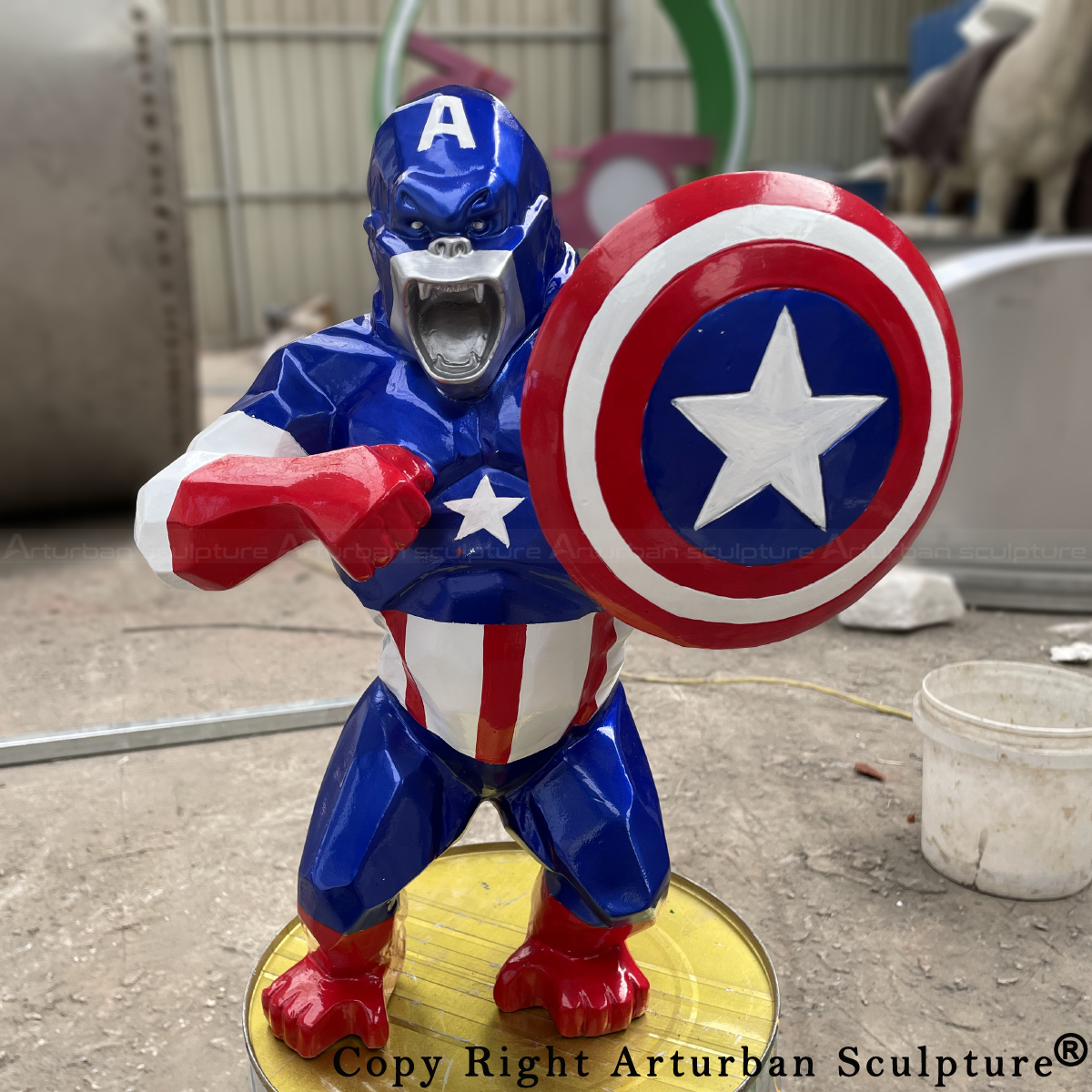 Captain Kong Statue dressed as Captain America holding a shield