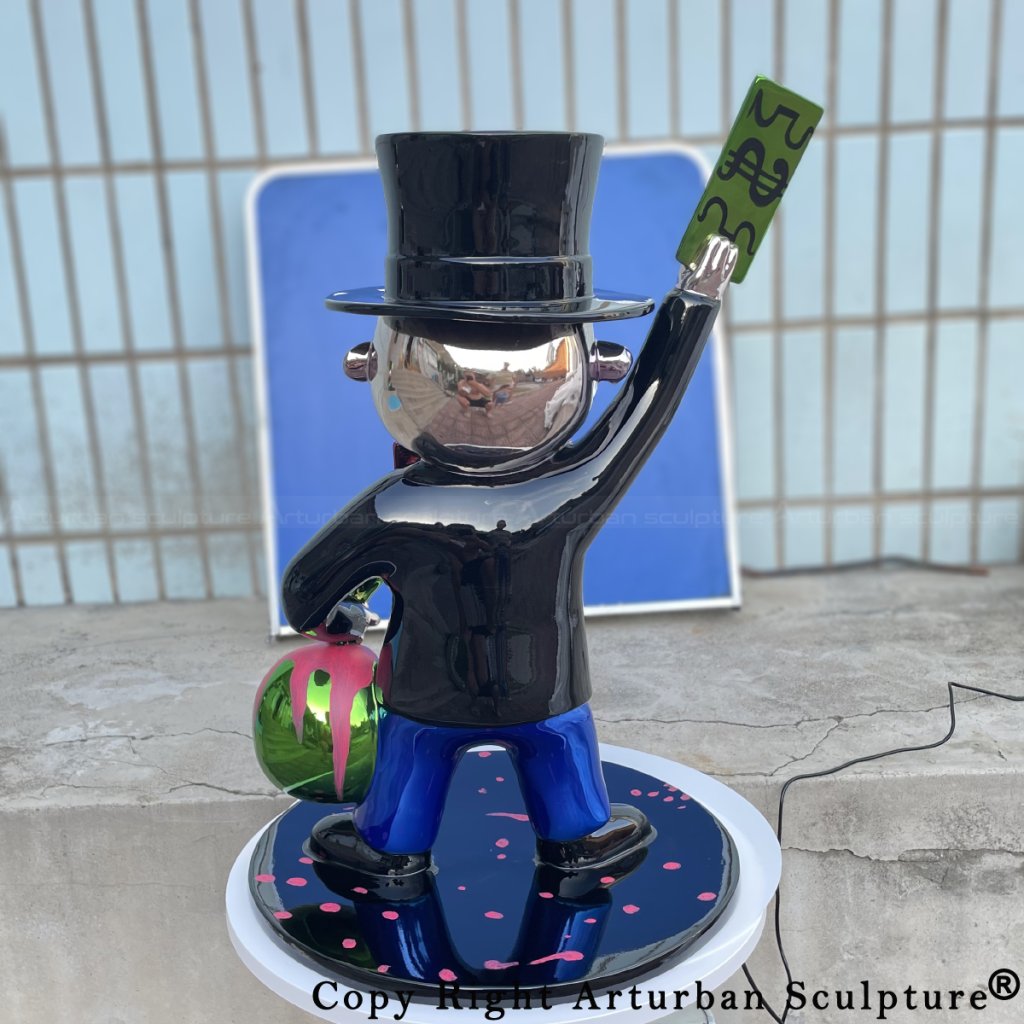 back view of Mr. Monopoly Statue standing on round base