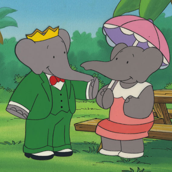 Babar the Elephant wearing a green suit and crown, talking with Celeste on a park bench