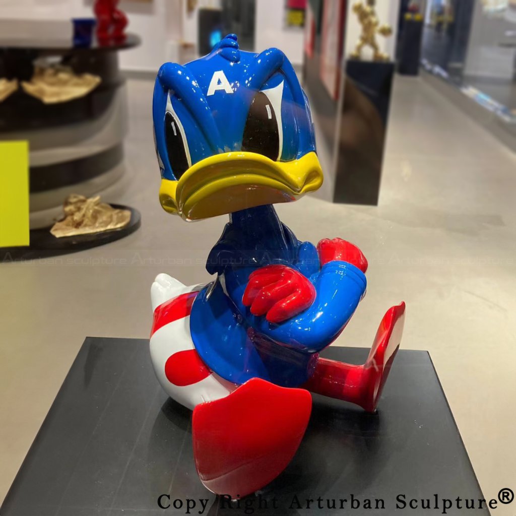 Donald Duck Ornament sitting with arms folded