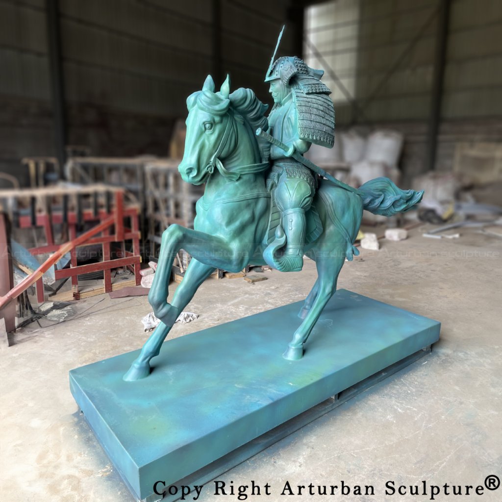 Japanese Samurai Statue showing the warrior in full armor on horseback