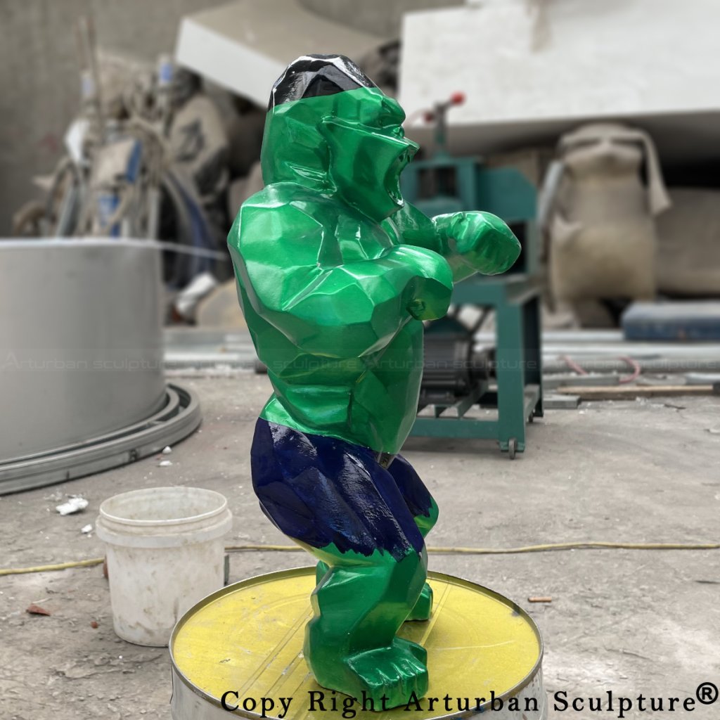 Side view of a green Hulk King Kong statue