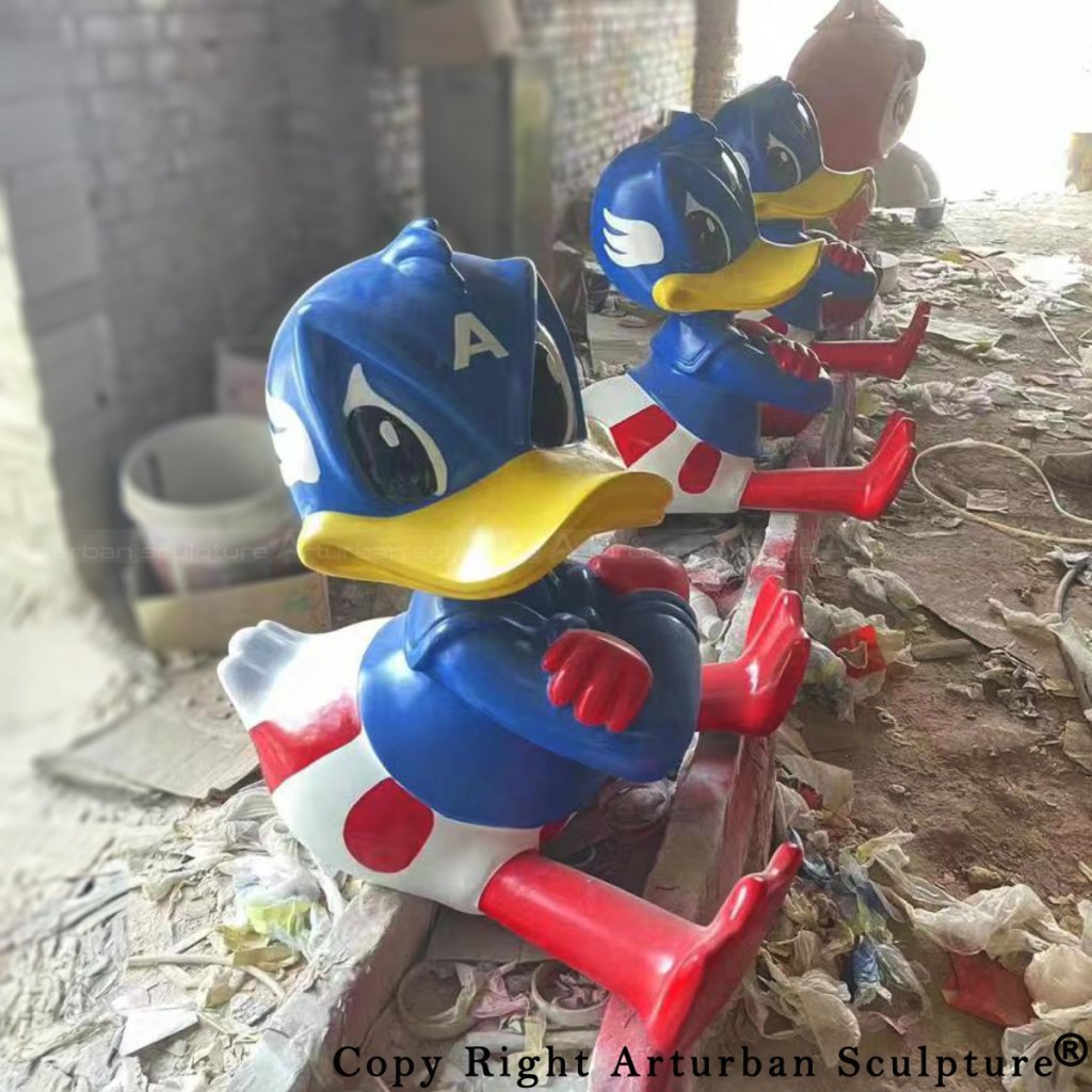 Row of donald duck fiberglass statues