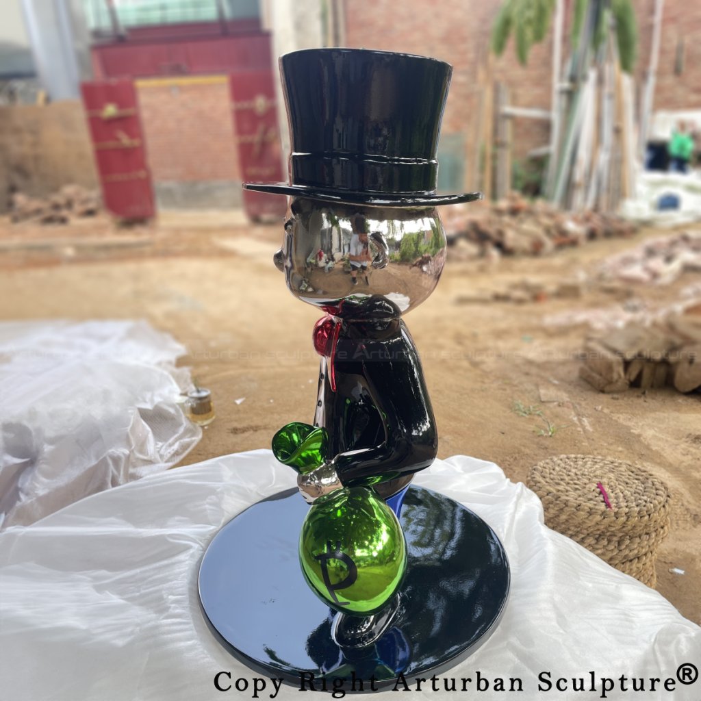 side view of Monopoly Man sculpture