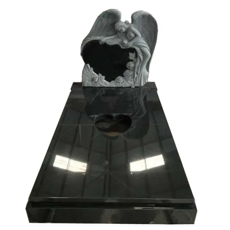 A full gravestone view with the Angel and Heart Headstone sculpture