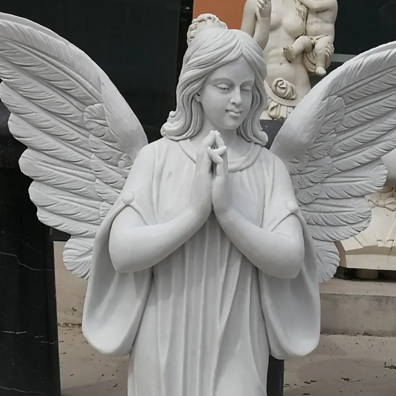 Close-up of Praying Angel Statue for memorial or cemetery