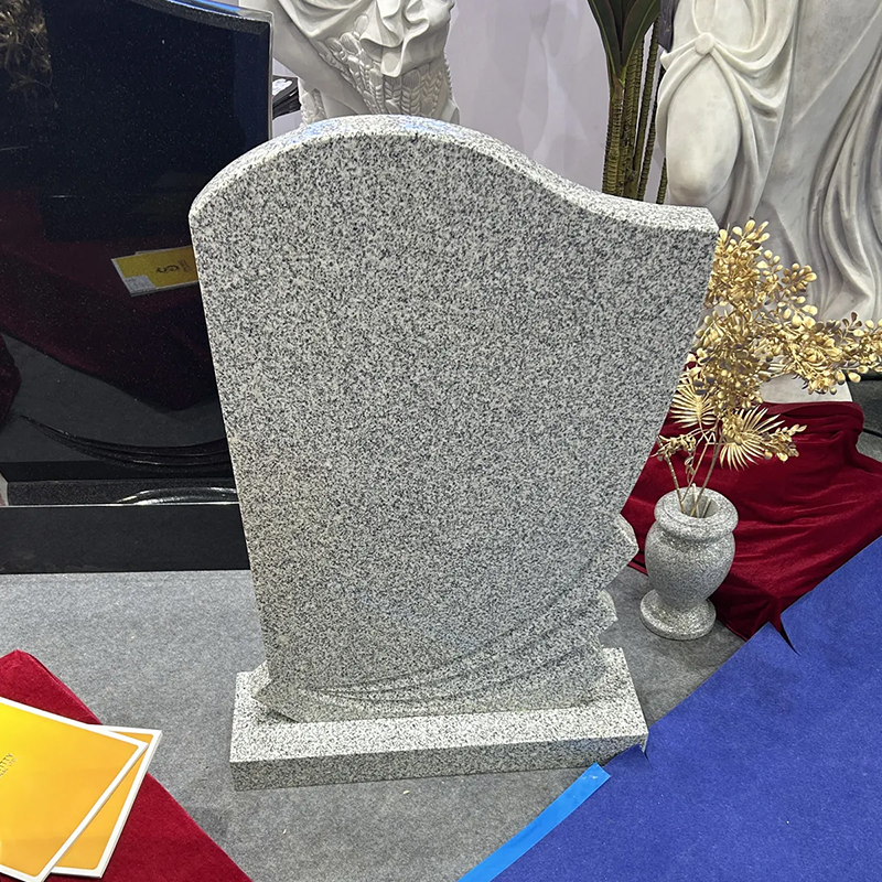 Granite Headstones for Sale with a small vase next to it