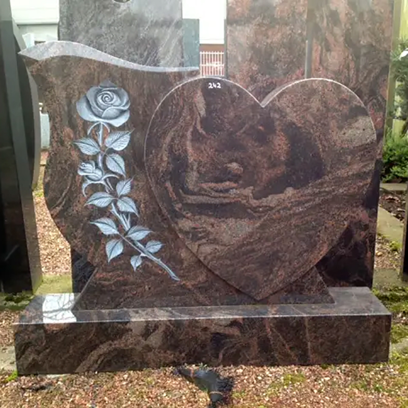 Granite Memorial Headstones eaturing heart-shaped designs with rose motifs
