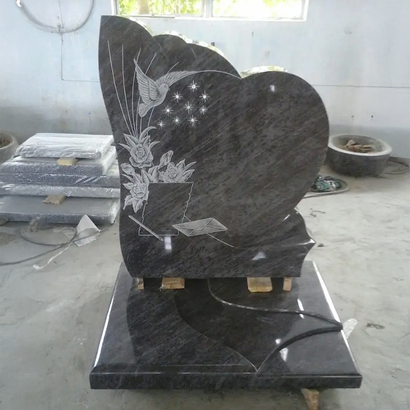 Granite Memorial Headstones with bird and floral carvings