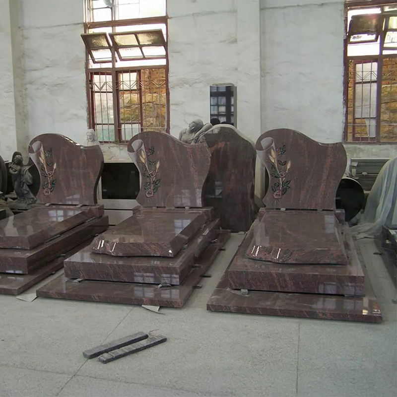 Grave Headstones with floral designs and large Slabs base