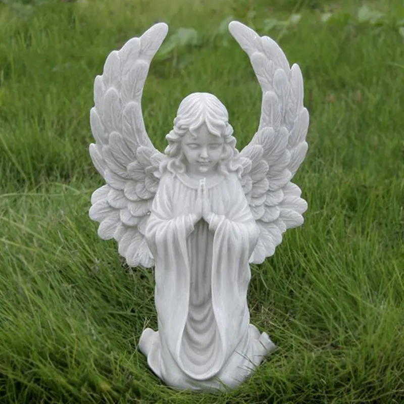 Kneeling and praying Angel child Figurine with wings up