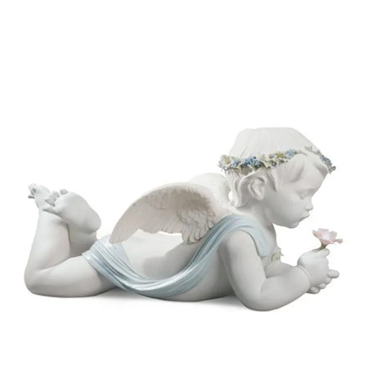 Little Angel Ornament resin statue lying on ground and holding flower