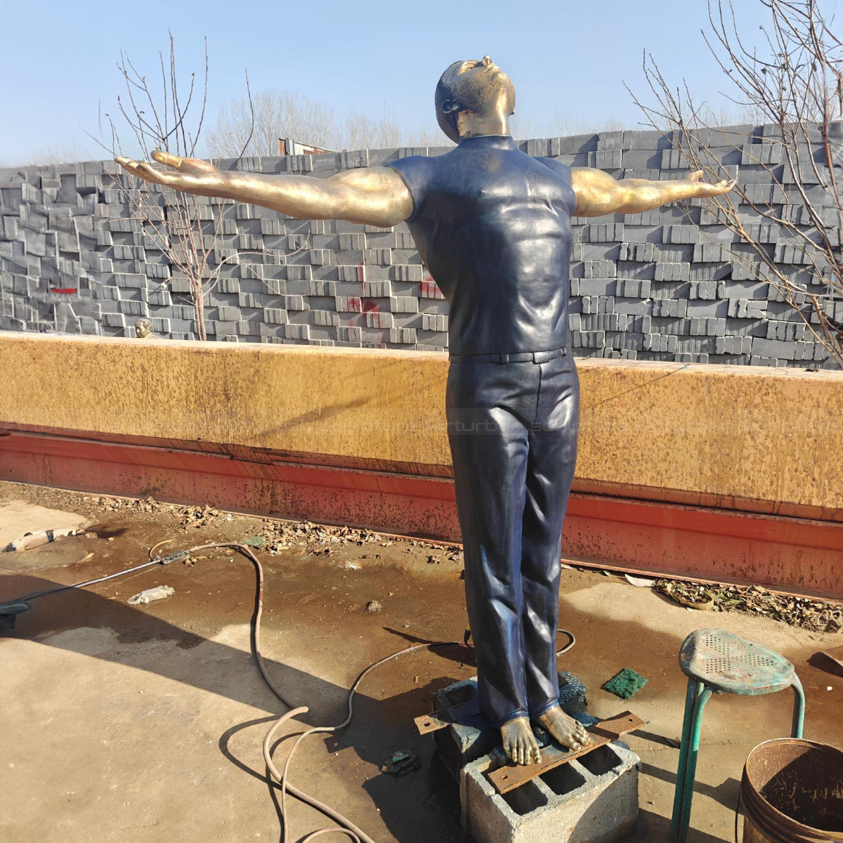 Man with Arms Out bronze Sculpture