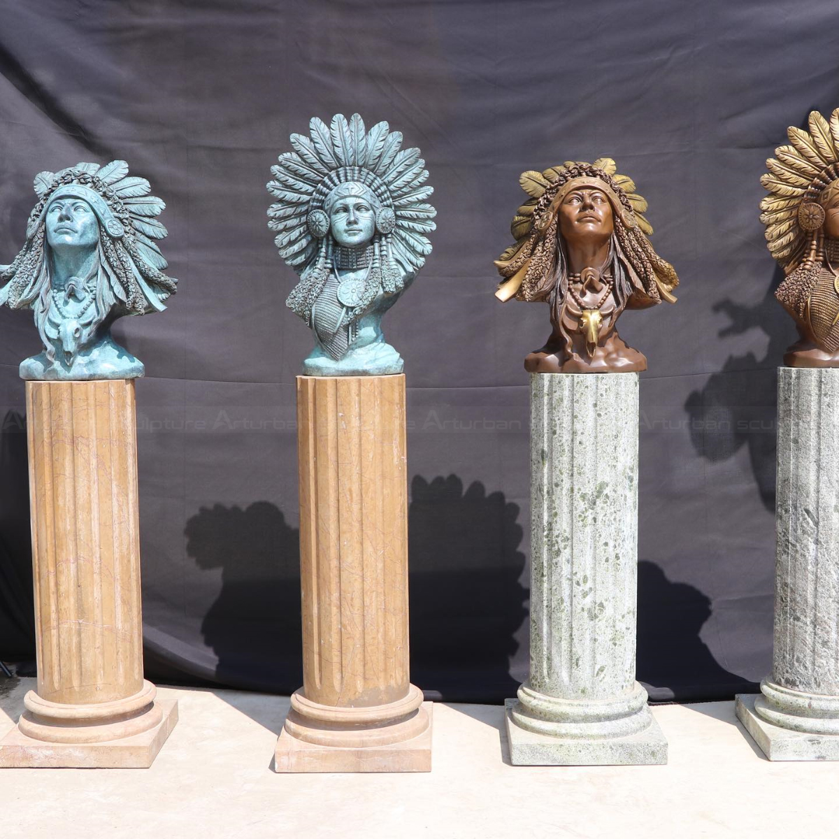Native American Chief with feathered headdresses Bust statue placed on marble column