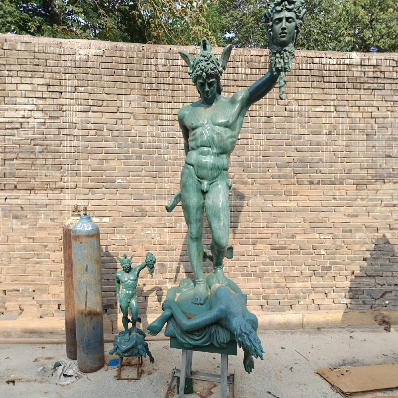Perseus Beheading Medusa Statue showing Perseus holding Medusa's head
