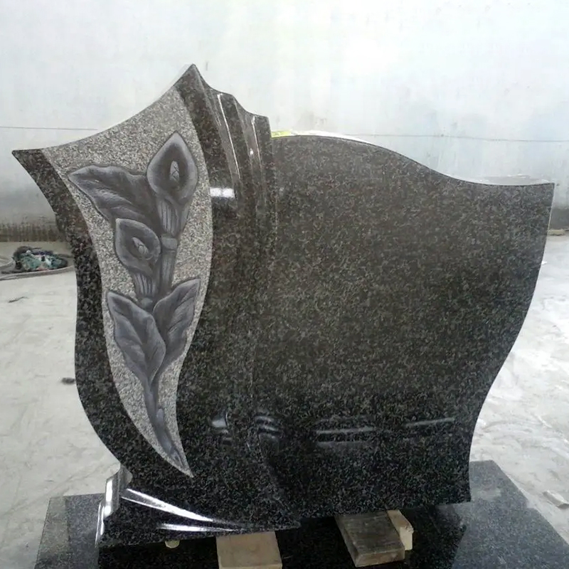 Polished granite Headstone with a calla lily relief