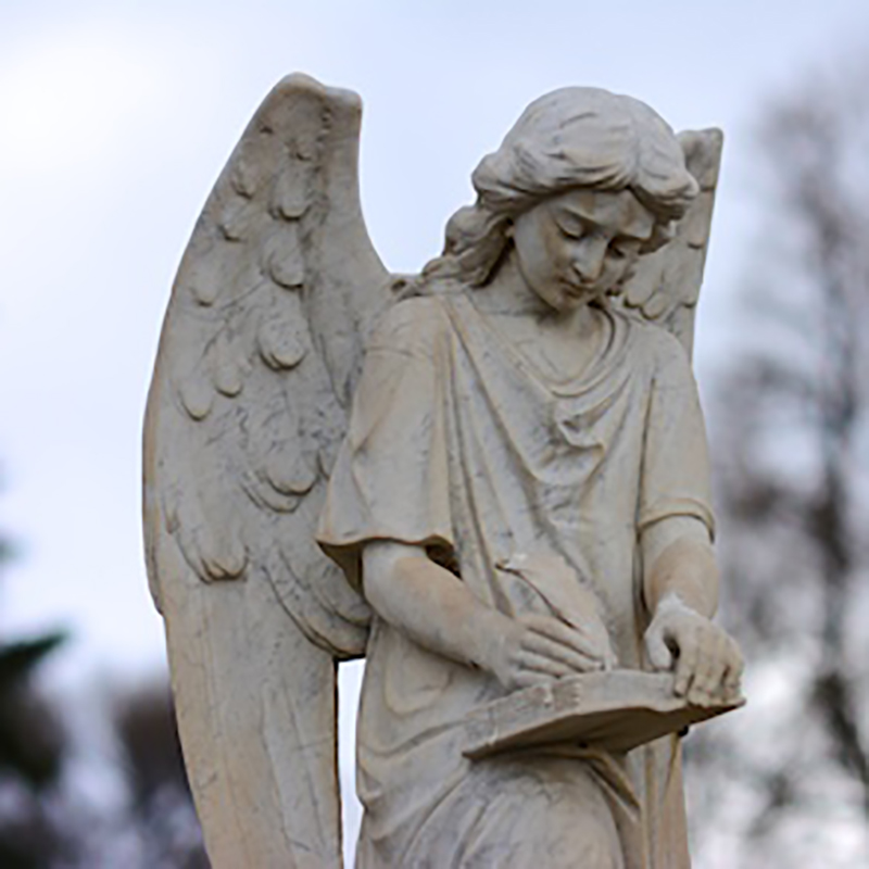Recording Angel marble Statue showing angel writting in the life of book